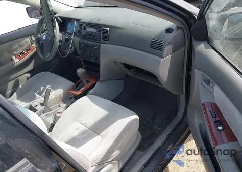 2003 Toyota Corolla Le z USA, uszkodzony, nr VIN JTDBR32E130015622